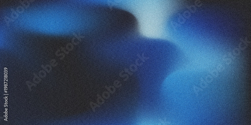 Abstract blue gradient blur with soft glowing light shapes and smooth dark tones creating modern futuristic background texture for digital design