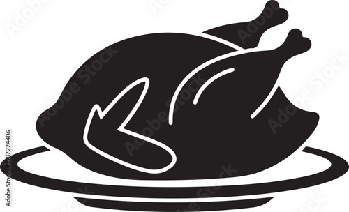 A large roasted turkey on a platter ready to be served for a holiday meal