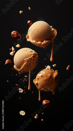 Floating caramel ice cream scoops with dripping sauce and hazelnuts