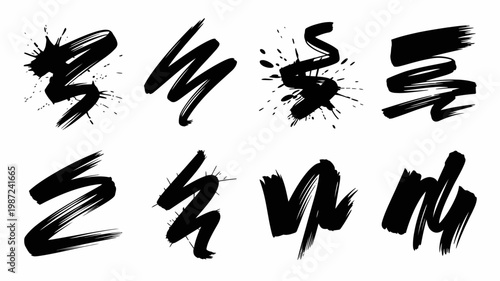 A collection of dynamic black ink brush strokes and splatters arranged on a white background showcasing artistic expression high quality professional detailed modern elegant stylish clean