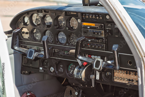 Obraz na płótnie Vintage analog cockpit panel of a light aircraft showing flight instruments and