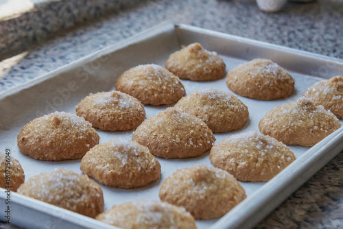Freshly baked sugar cookies on baking sheet