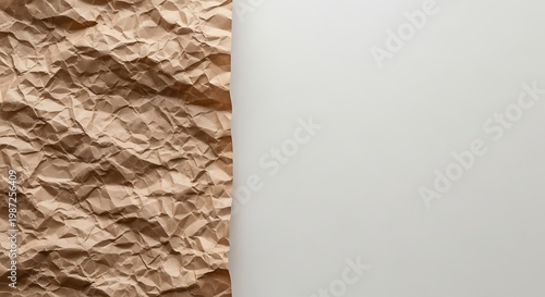 Crumpled brown paper texture against a plain light background crumpled paper rough de