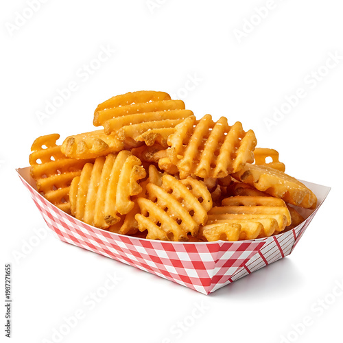 Crispy golden waffle fries in a red and white checkered paper basket on white background