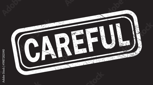 A white grungy stamp with the word careful