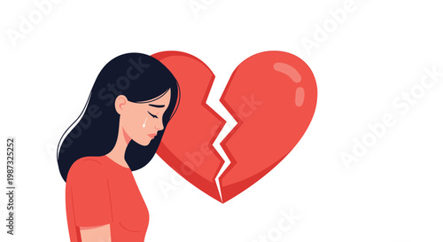 Sad young woman in a red shirt is crying next to a large red broken heart symbol representing grief, loss, or relationship breakup.