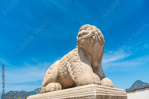 Seoul, South Korea - Apr. 12, 2026 : Haetae Statue and Gwanghwamun Gate under Blue Sky, Seoul, South Korea