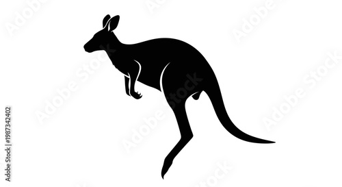 Black silhouette of a kangaroo in a jumping or bounding pose on a white background, showcasing its distinctive marsupial shape and powerful legs.