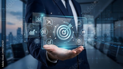 Businessman holding target goal hologram with business strategy icons