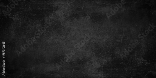 Dark grunge stone texture background with scratches, black slate wall surface for copy space. A dark grunge black chalkboard background, blank grey chalk wall design, vintage surface