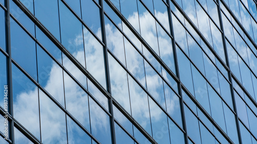 Fotografie Clean and minimalist architectural detail of high-rise building glass panels ref