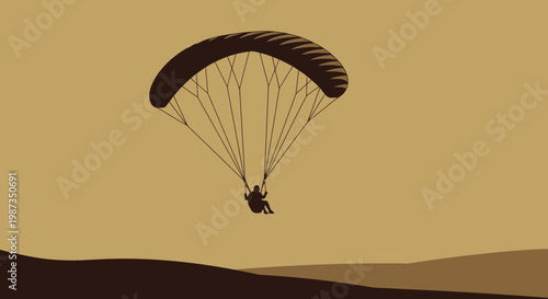 Silhouette Paraglider Soaring Above Desert Dunes During Golden Hour