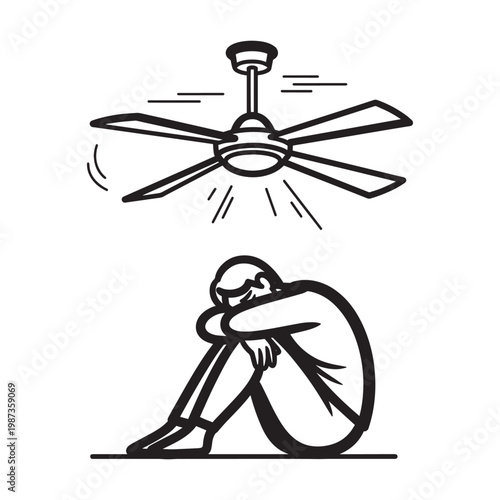 Man sitting under a ceiling fan on a hot day
