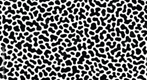 Seamless abstract pattern of black organic shapes on white background reminiscent of animal print or cell structures.