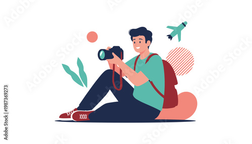 A young traveler with camera sitting on the ground taking a photo