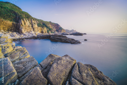 Wallpaper Mural Longdong Bay Cape Coast Landscape - Northeast and Yilan Coast National Scenic Area. Long exposure at dawn, shot in Gongliao District, New Taipei, Taiwan. Torontodigital.ca