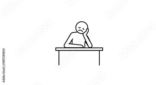 A person sitting at a desk looking bored.