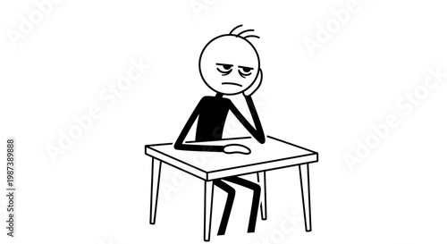 A frustrated man sitting at a desk.