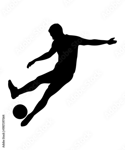 silhouette of a man playing football