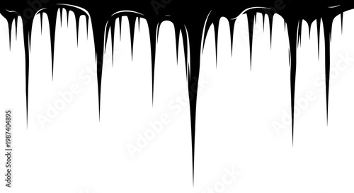 Black paint drips falling down on white background creating a dark abstract design element