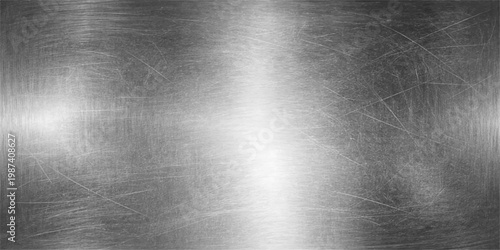 A polished stainless steel plate featuring a brushed silver metal texture and a shiny industrial aluminum surface pattern with grey metallic reflections for a sleek material backdrop