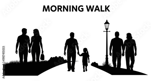 Silhouettes of couples and family walking during a morning stroll with lamppost