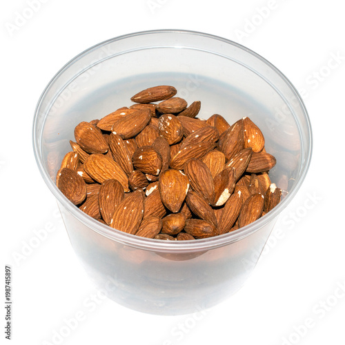 Almonds and peeled nuts.Almonds are edible seed kernels or the seeds of the plant of the same name from the Almond subgenus of the Plum genus.Almonds are common.