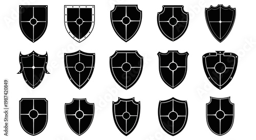 Collection of 15 unique black shield icons with white outlines and geometric designs on a plain white background for protection and security concepts