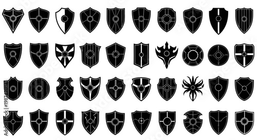 Collection of black shield icons with various designs on white background for graphic design