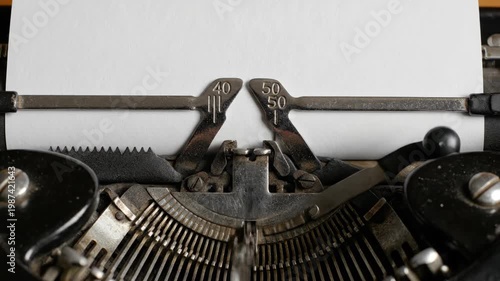 Typewriter Carriage with Blank Paper Sheet for Creative Writing