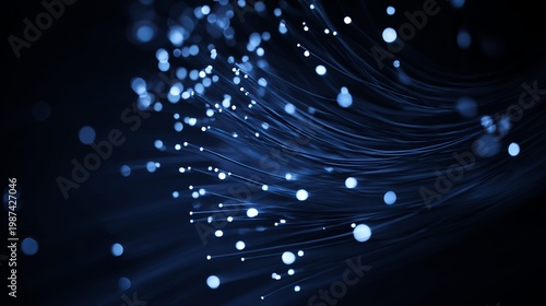 A close-up view of glowing blue fiber optic cables against a dark background