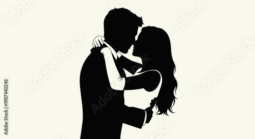 Silhouette of a loving couple embracing intimately.