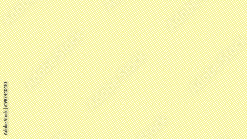 Pale yellow background with small white polka dots texture pattern
