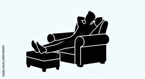 Silhouette of a person relaxing in an armchair with feet up on an ottoman.
