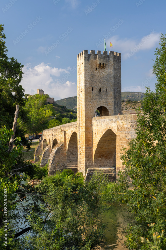 Obraz premium Frias medieval arch bridge with defense tower