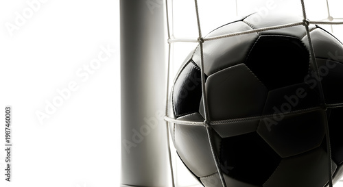 Soccer ball inside a goal net, depicting a successful goal or victory in the game