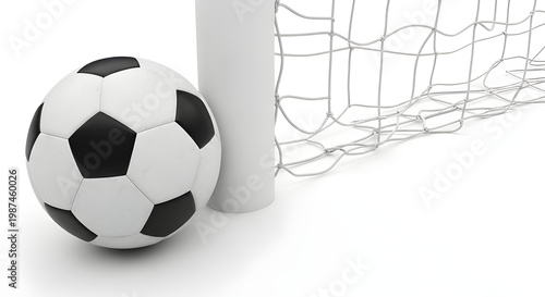 A soccer ball near a soccer goal