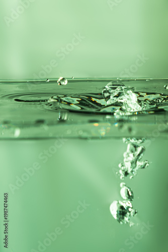 208.Green-Tinted Bubbles Rising in Transparent Water