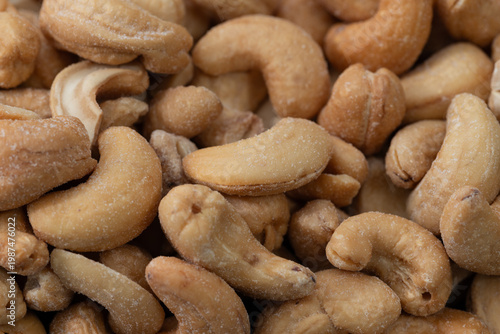 cashew nuts on a wooden background macro