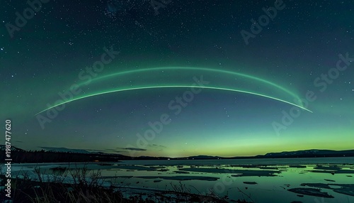 vibrant proton arc aurora over snowy winter lake at night