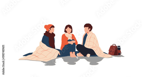 Group of Young Adults Sitting on a Blanket in a Relaxed Outdoor Setting