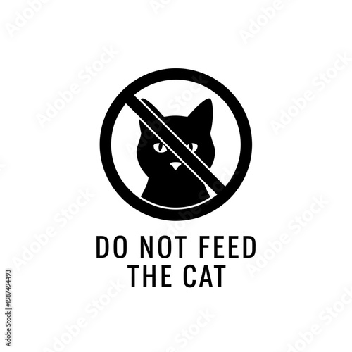 A prohibition sign depicting a cat with do not feed text