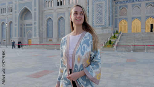 Young Woman Walking Near Islamic Civilization Center in Tashkent