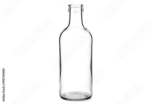 A clear glass bottle standing alone on a white background