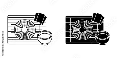 Stylized graphic illustrations of sushi rolls and dipping sauce on a bamboo mat, presented in both outline and solid black vector formats for versatile design applications.