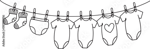 Black and White Outline of Baby Clothes Drying on a Line
