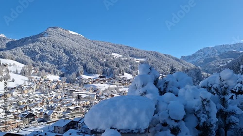 City panorama of Ortisei on a sunny winter day.