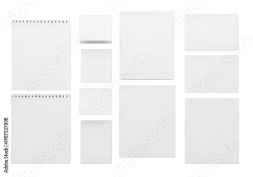 Collection of blank white stationery items including various paper sizes, notebooks, and envelopes isolated on transparent background, png