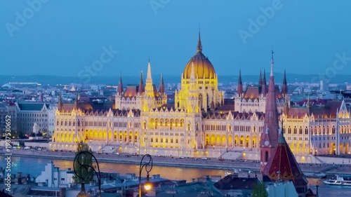 4K drone video footage Illuminated Hungarian Parliament Building at night, Parliament of Budapest. Aerial drone view of Budapest architecture, stunning historic building