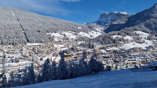 City panorama of Ortisei on a sunny winter day.